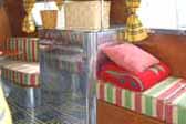 Vintage bedding and furnishings in amazing 1936 Bowlus Trailer